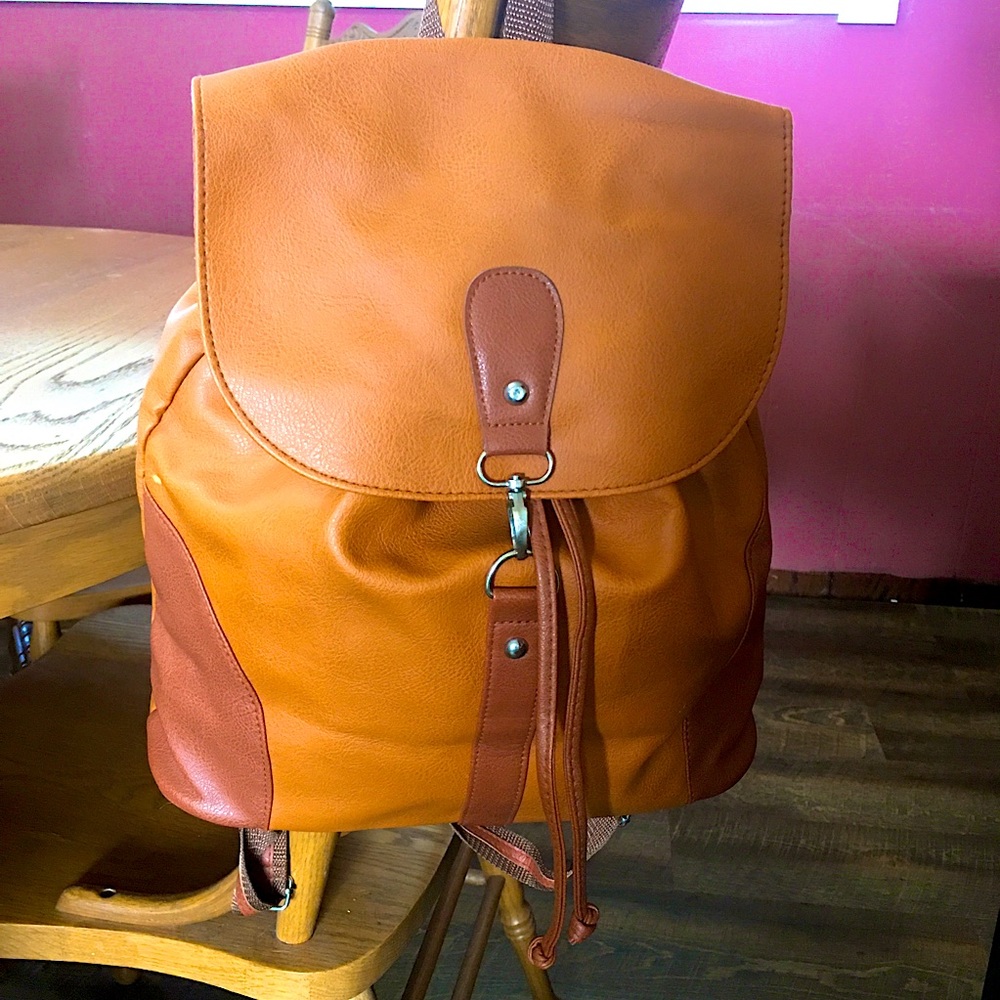 Cute sintetic leather backpack